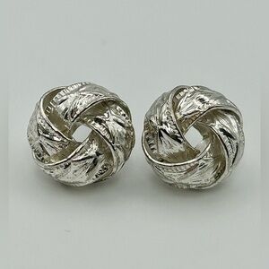 Silver Tone Knot Stud Post Earrings with Raised “X” Pattern and Edged Border